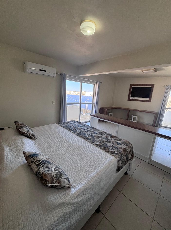 Suíte Panorâmica — quarto com vista